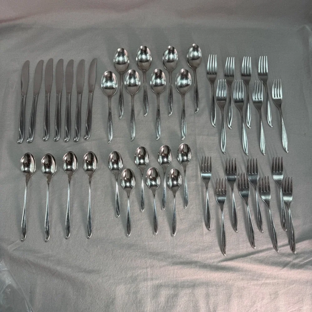 International Silver 42 Piece Tradewinds Jamaica Stainless Swirl Flatware Set